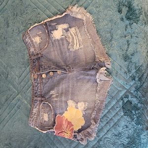 Cali 1850, size 11, jean shorts with sequin floral.
